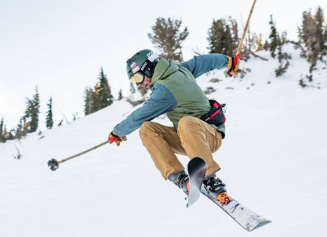 Man on skis getting air. Man on skis getting air.
