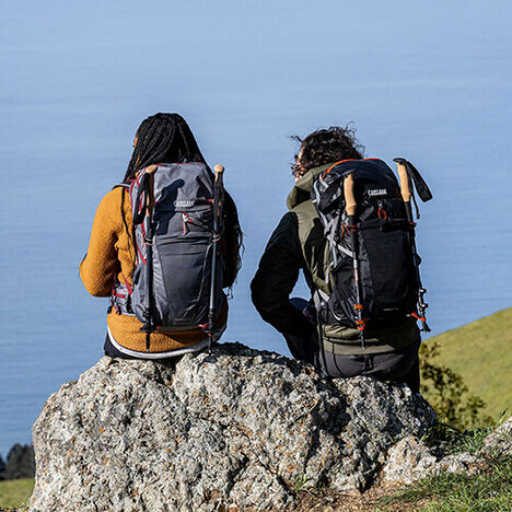 Two hikers taking a break with a view