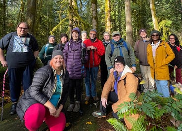 a group of hikers in the woods