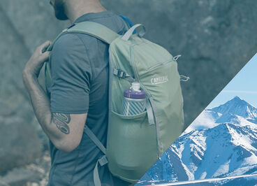 Man wearing his Cloudwalker hydration pack with a Podium Bottle in the bottle pocket.