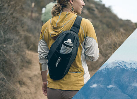 Woman hiking with her arete sling.