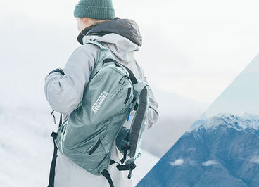 Person putting on their Powderhound hydration pack.
