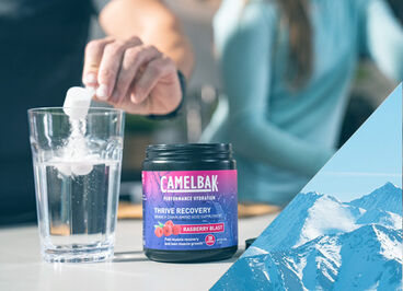 Person making a drink with BCAAs