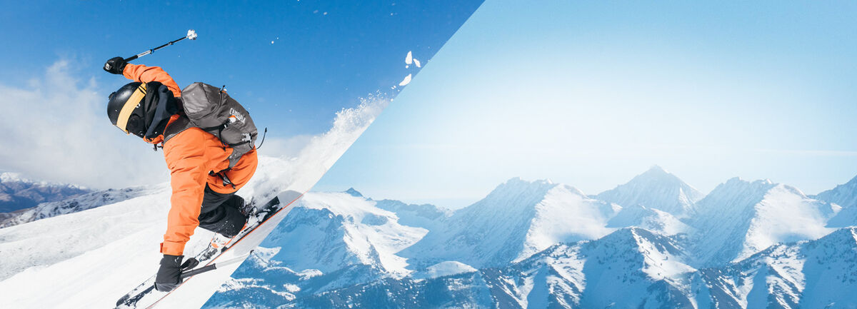 Skier shredding down a hill.  