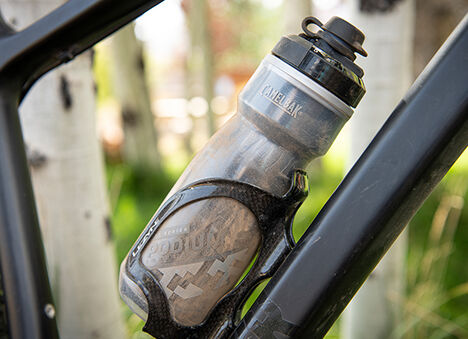 Podium Dirt Water Bottle in a bike mount