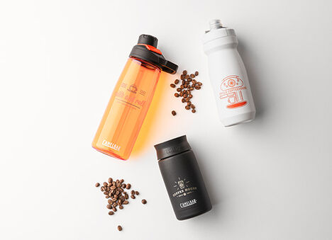 Two custom water bottles and one custom travel mug with coffee beans. Two custom water bottles and one custom travel mug with coffee beans.