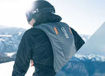 Man with a Zoid hydration pack on.