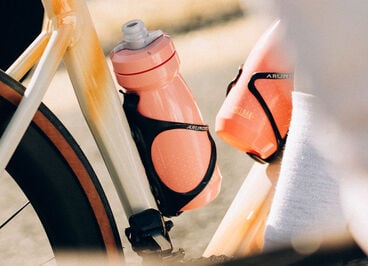 two podium bottles on a bicycle