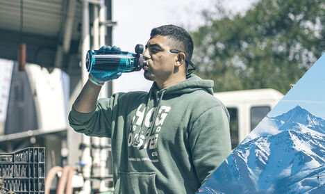 Man drinking from his Chute Mag with Tritan Renew water bottle. Man drinking from his Chute Mag with Tritan Renew water bottle.