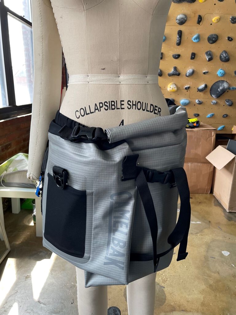 Close up image of the Hydro skirt on a mannequin with a climbing wall in the background. Close up image of the Hydro skirt on a mannequin with a climbing wall in the background.