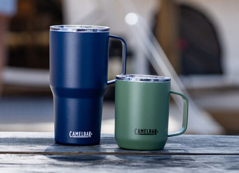 Two Stainless Steel bottles lined up in a row. Two Stainless Steel bottles lined up in a row.