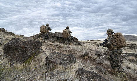 Three Men on a Hill.