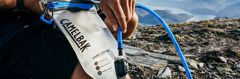 https://www.camelbak.com/dw/image/v2/BDBJ_PRD/on/demandware.static/-/Library-Sites-CamelBakSharedLibrary/default/dwc29e82ac/images/Main%20Nav%20Flyout/Navigation%20Drawers/Single%20Drawers/R23-Nav-Rservoirs-909x300.jpg?sw=468&sfrm=jpg