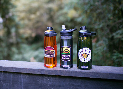 Three custom bottles in a line up. Three custom bottles in a line up.