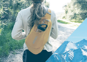 woman walking with an arete sling