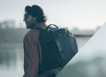 Man wearing a CamelBak commute pack.