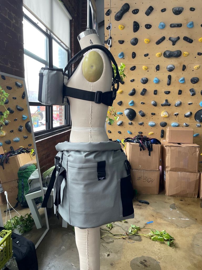Hydro skirt on a mannequin turned to the left with a climbing wall in the background. Hydro skirt on a mannequin turned to the left with a climbing wall in the background.