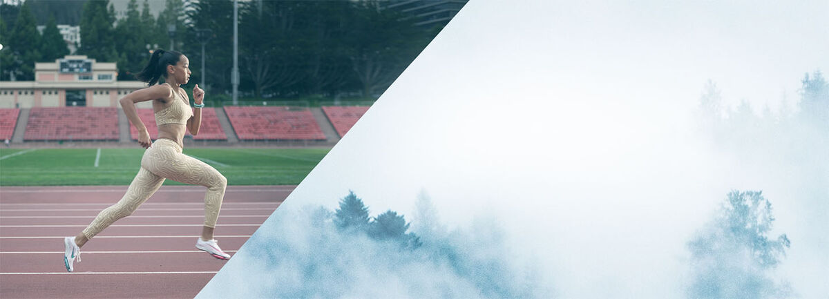 Woman sprinting on a track.
