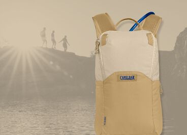 backpack over a background of hikers