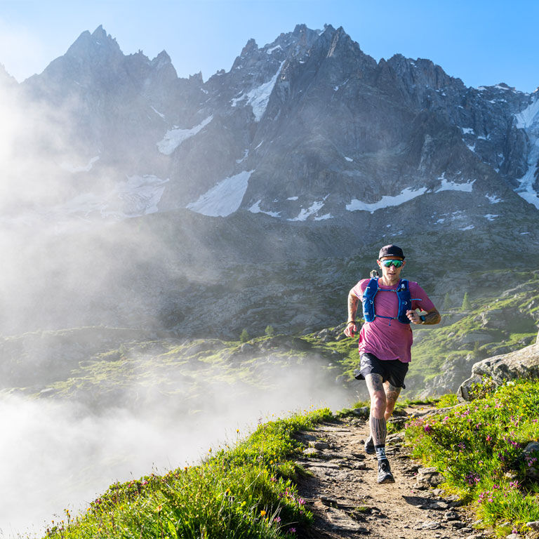 Man running with a Zephyr running vest Man running with a Zephyr running vest