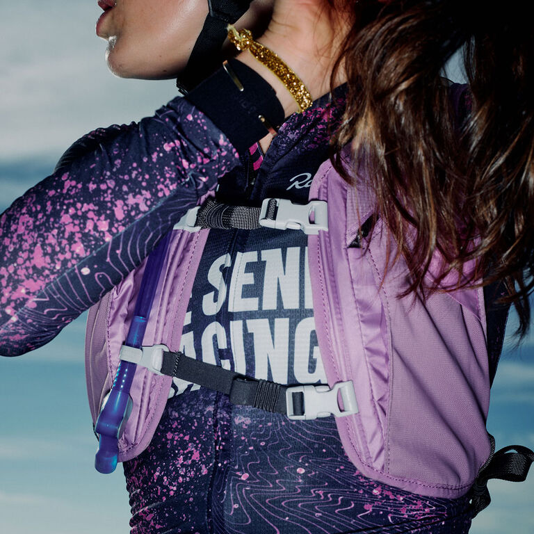 Close up of Woman with purple hydration vest
