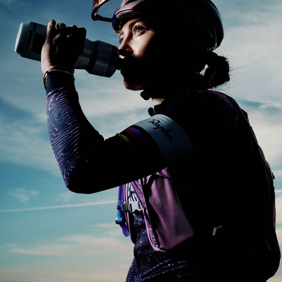 Woman drinking out of Camelbak water bottle