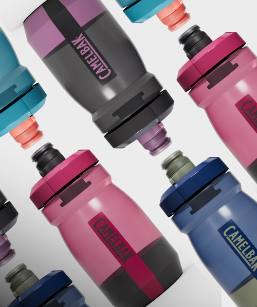 multiple blue and pink cycling bottles on gray gradient