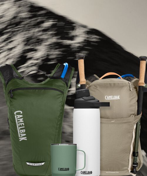 backpacks and bottles on a mountain background