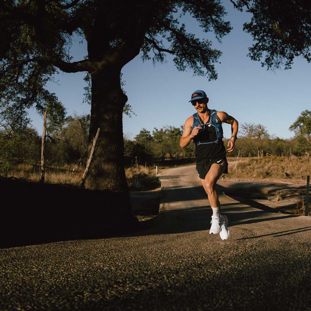 person running with a run vest