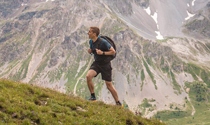 Man hiking on mountain. Man hiking on mountain.