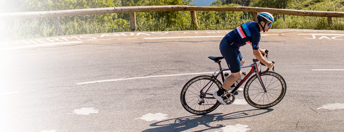 Cyclist riding up a mountain