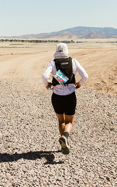 Sally McCrae Running through a trail